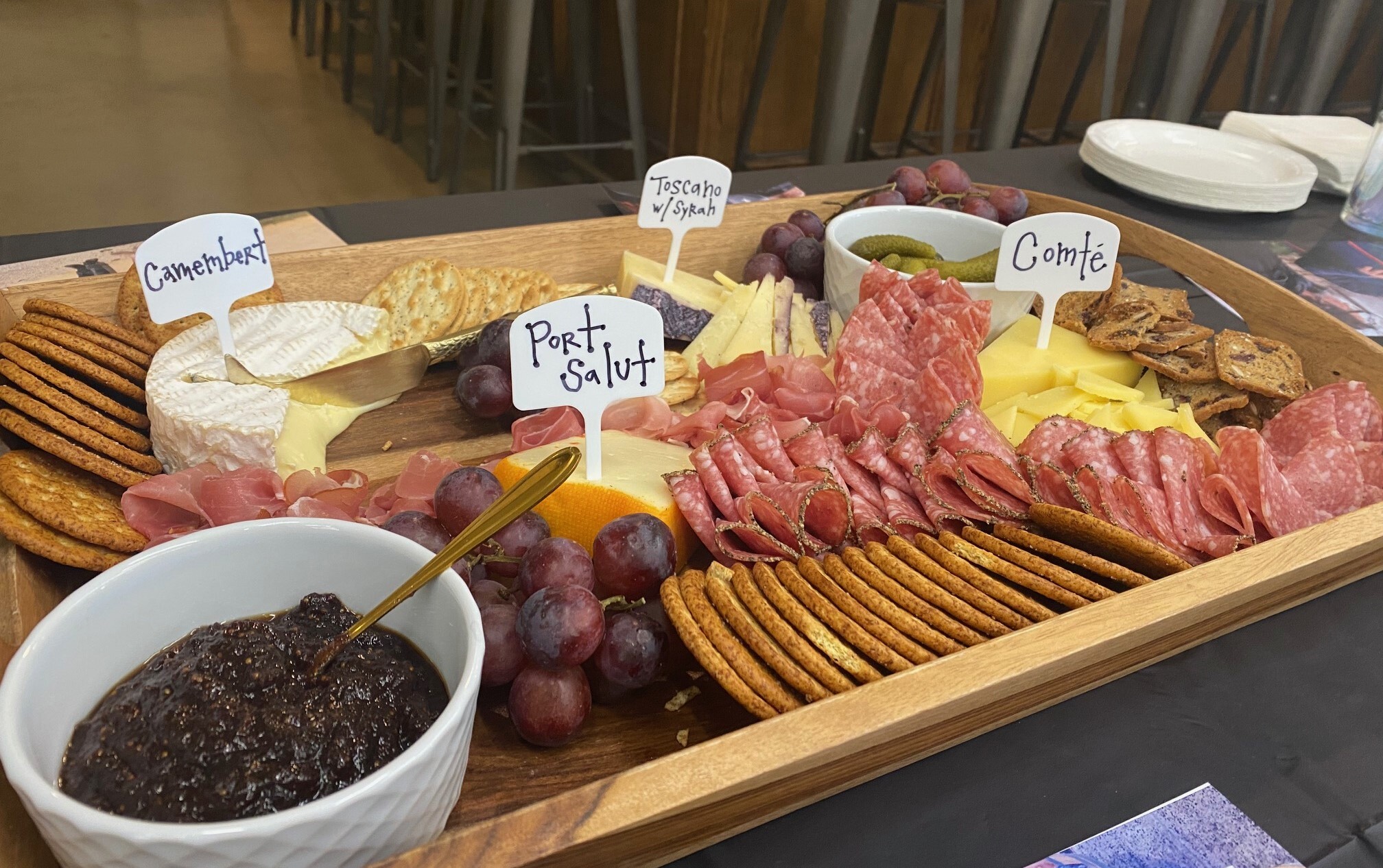 An image of the assortment of food items, including cheese and biscuits to pair with your sake wine.